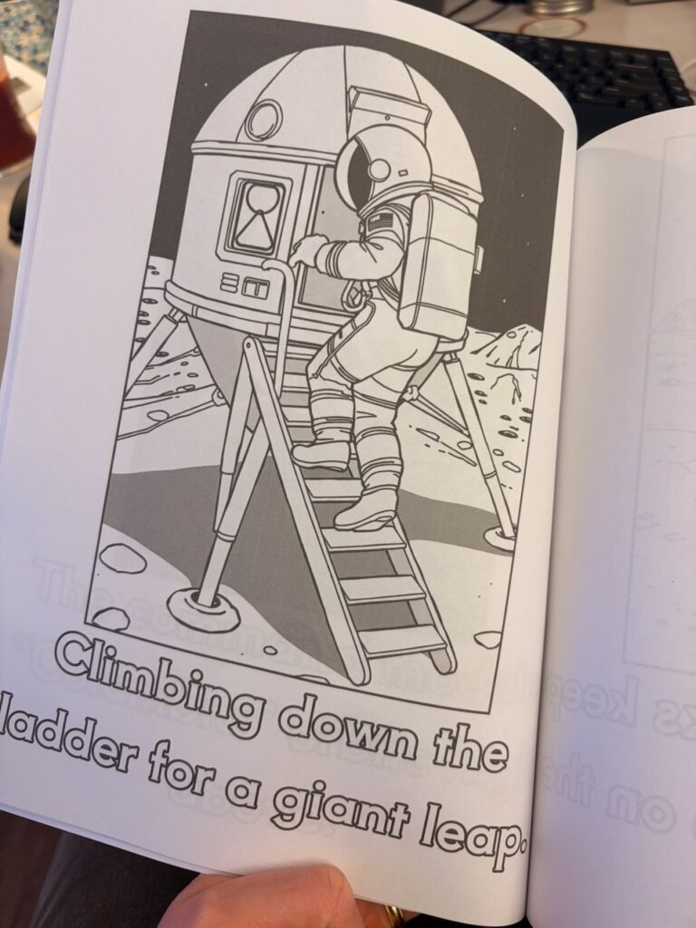 Astronaut climbing down the lunar module ladder